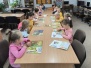 Dzień Głośnego Czytania - wizyta klasy pierwszej w bibliotece